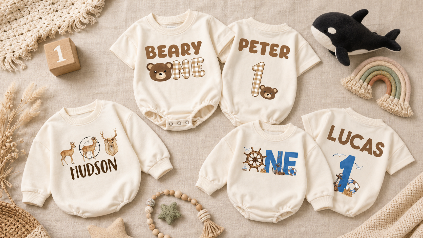 Three personalized Cozyorca first birthday outfits in deer, bear, and nautical themes